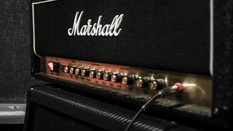 What happens if my speaker impedance is too low or too high?